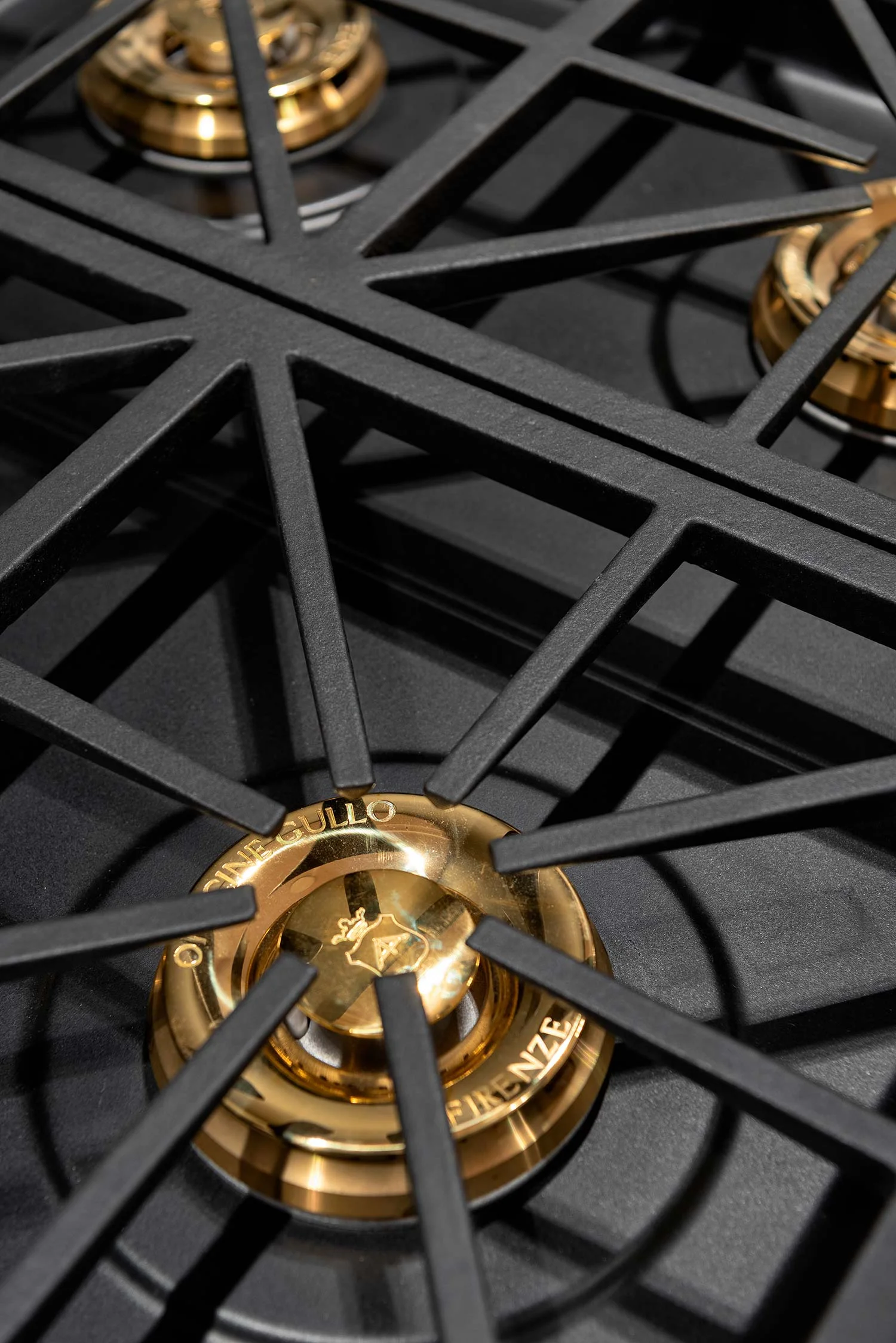 The fine brass double burners and the hefty cast iron grills