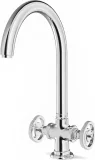 FAUCET WITH “LOBE” KNOBS